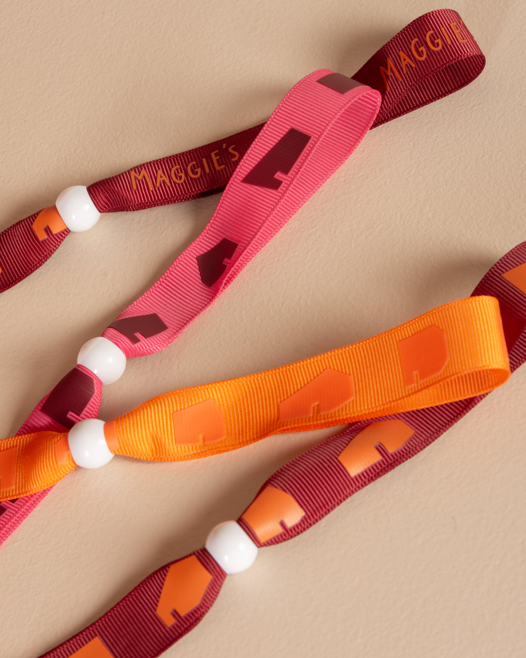 Armbandje - oranje - logo